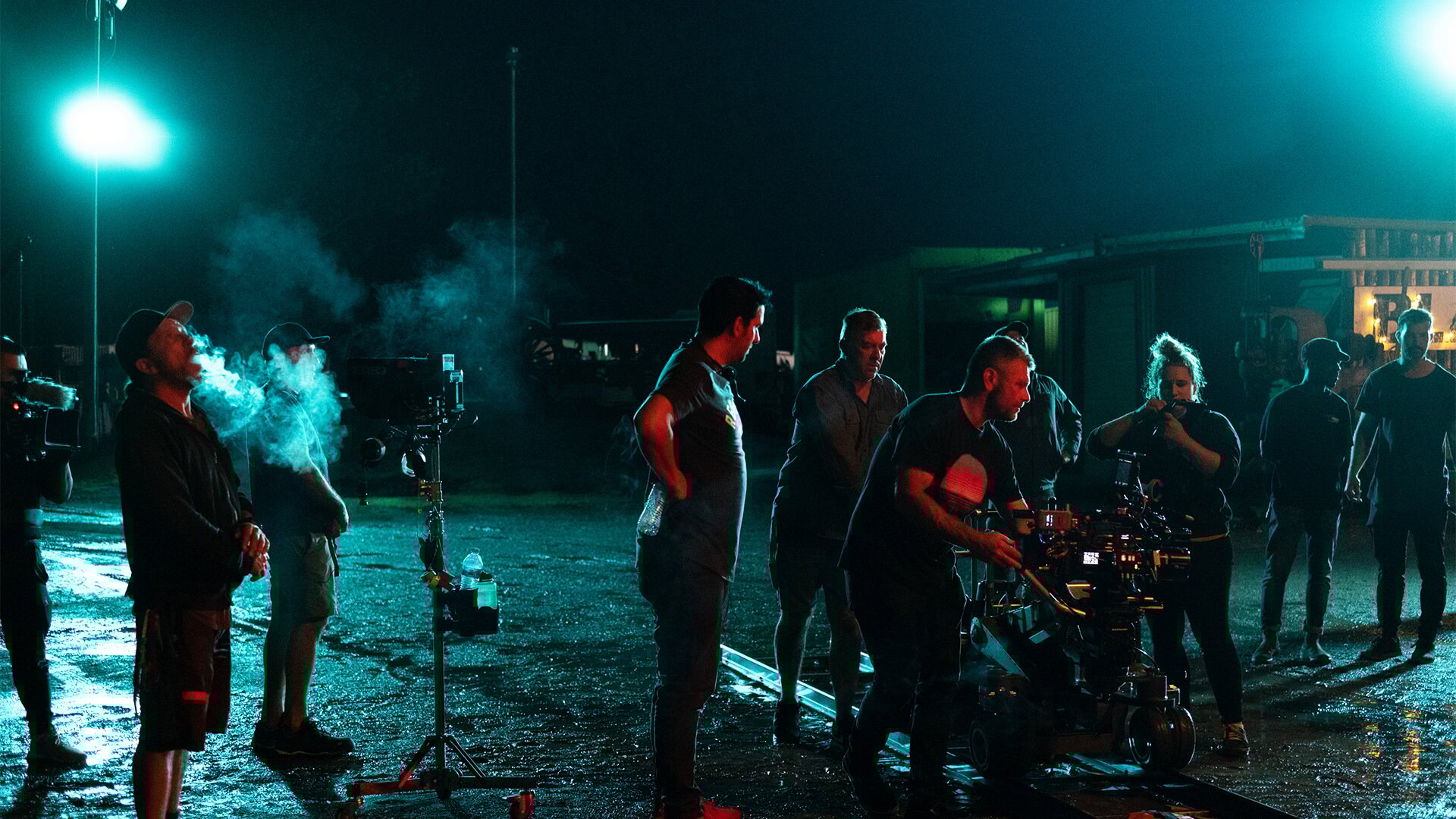 PX_segments_features_v1 Film set lit by two large lights in the distance